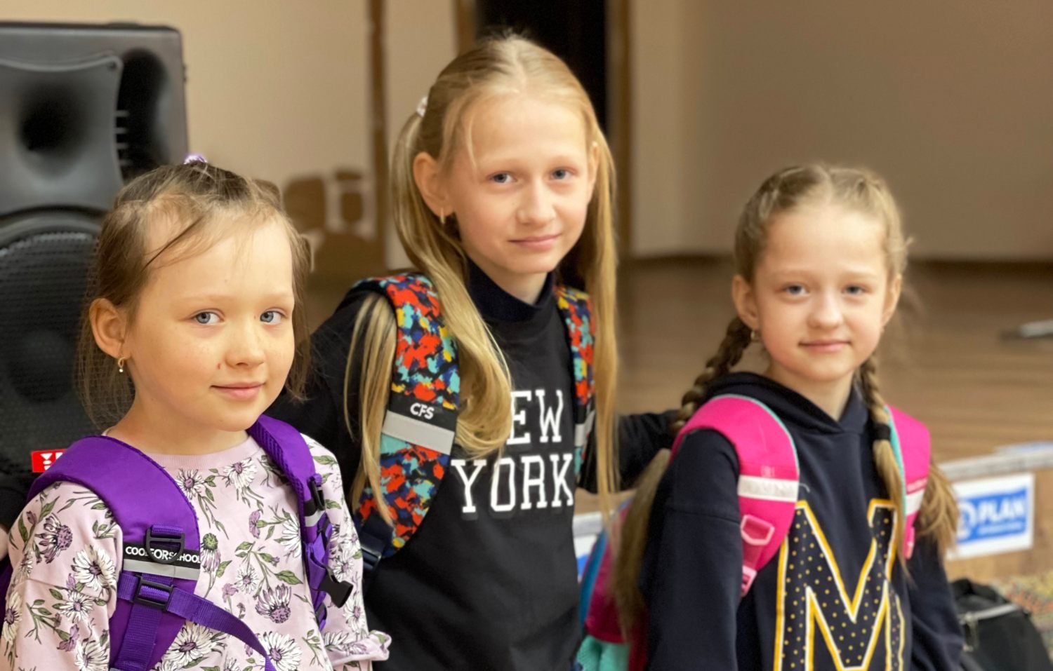 Three Ukrainian girls going back to school