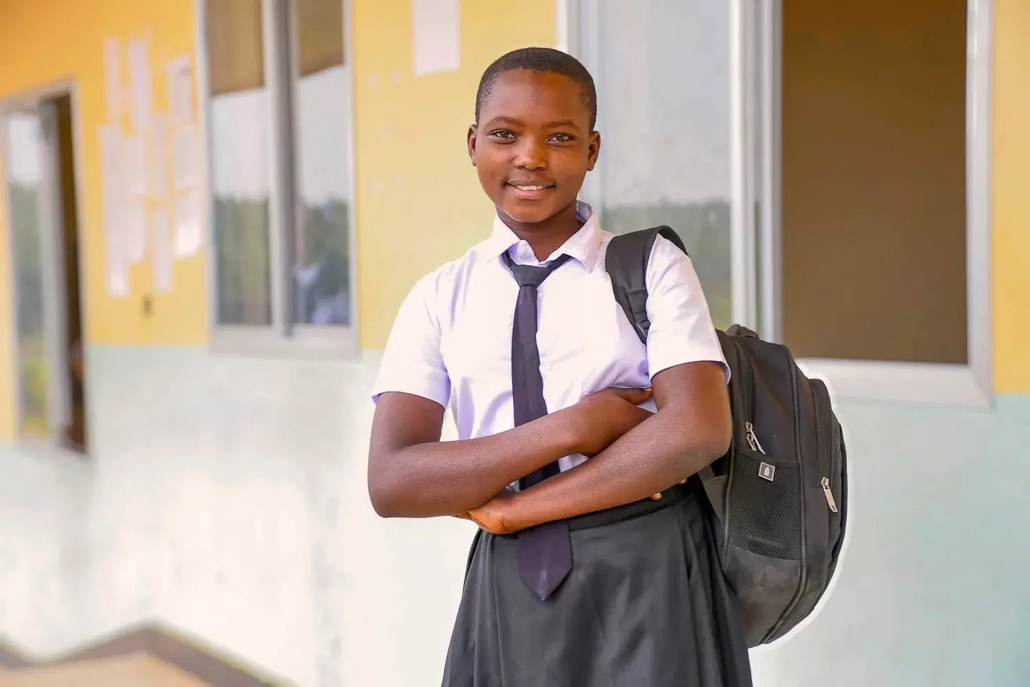Christina uit Tanzania wist aan een huwelijk te ontsnappen en ging terug naar school. 