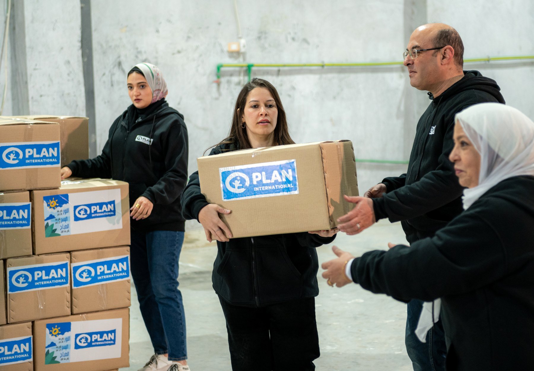 Plan staff in Egypt prepare boxes of first aid kits ready for transport to Gaza (1)