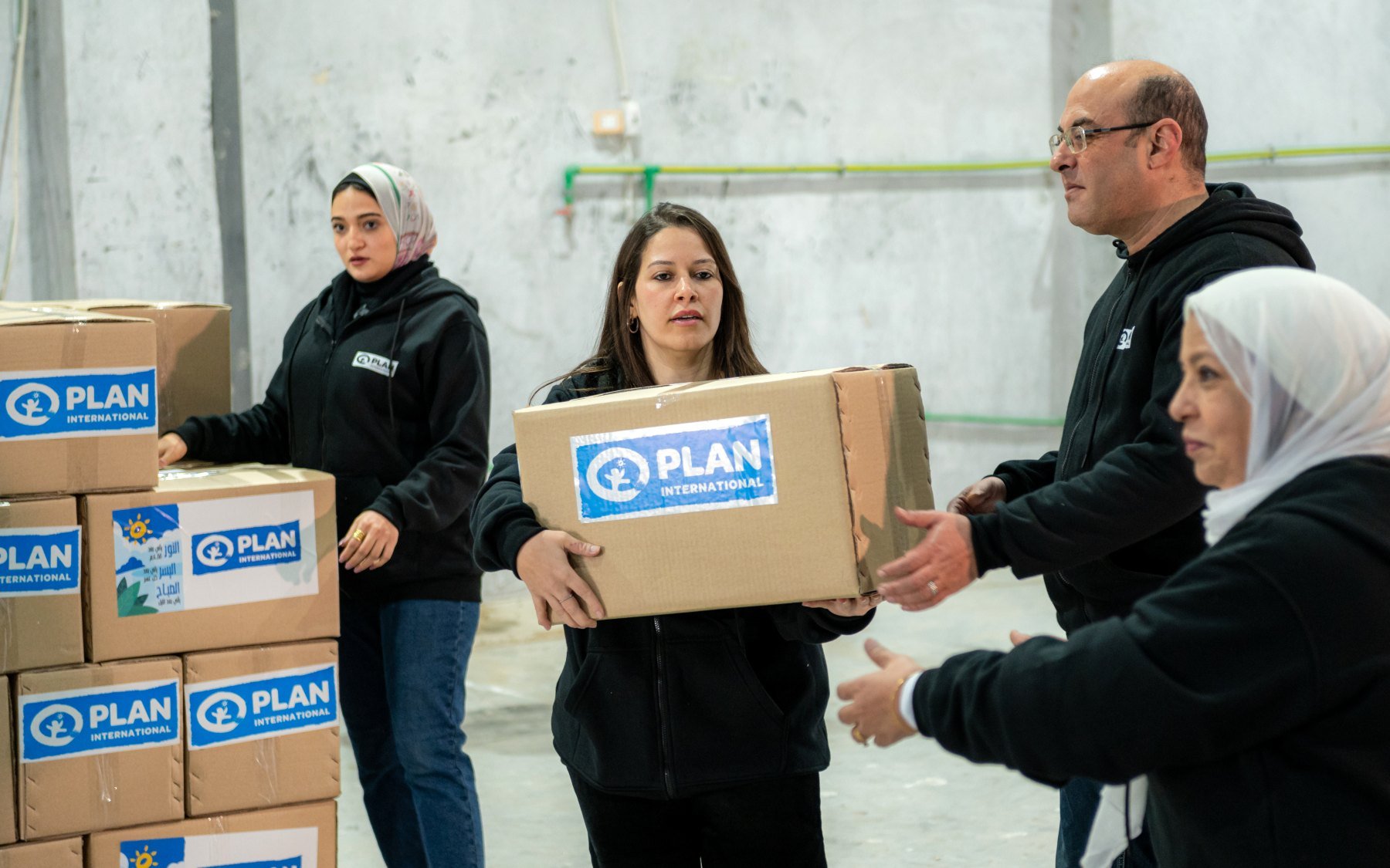 Plan staff in Egypt prepare boxes of first aid kits ready for transport to Gaza (2)